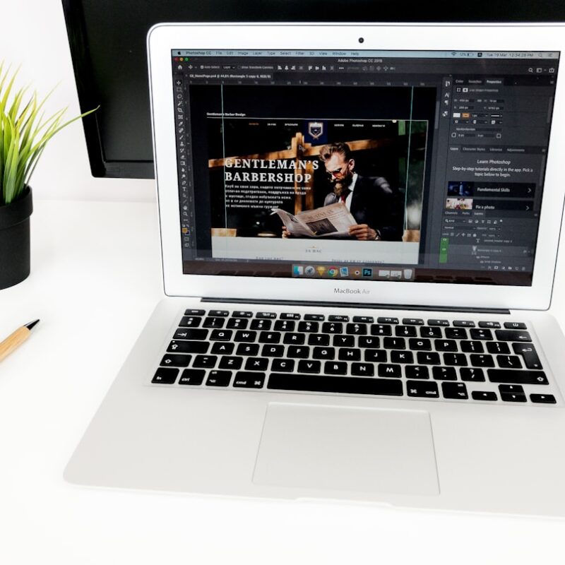 turned-on white MacBook Air
