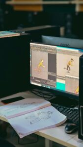 Monitor showing an animation of a man in a yellow shirt running